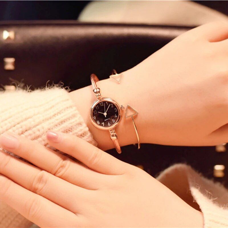 Elegant Gold Bangle Quartz Watch for Women - Image 4
